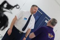 Male officer talking to a resident